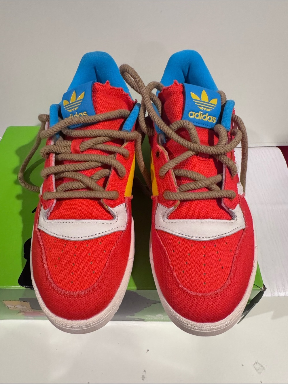 adidas Red Sneakers with Blue Collar and Yellow Accent